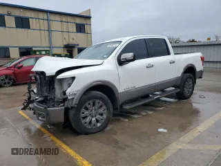 2019 Nissan Titan Platinum Reserve с VIN 1N6AA1E55KN500573, выставлен на аукционе Copart как лот 82708714 с пробегом 115 286 миль миль и Списание • Salvage title. История ставок и продаж доступна на DreamBid. Изображение 1.