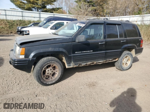 1998 Jeep Grand Cherokee Laredo with VIN 1J4GZ48YXWC299827, listed as a Copart auction lot 76898264 with 232,656 mi miles and Clean Title. Bid and sale history available at carsss.com. Image 1.