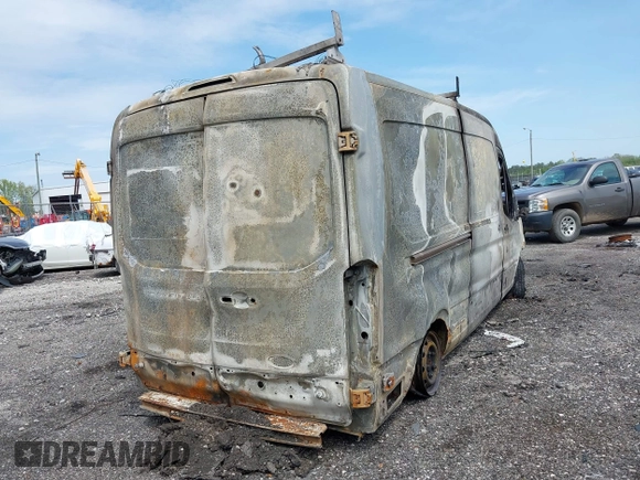 2015 Ford Transit Cargo with VIN 1FTNR2CG5FKA99184, listed as a IAAI auction lot 42143175 with Not provided miles and . Bid and sale history available at DreamBid. Image 4.