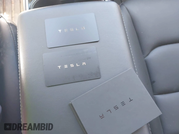 2020 Tesla Model Y Long Range with VIN 5YJYGDEE0LF041762, listed as a IAAI auction lot 40556913 with Not Provided miles and . Bid and sale history available at DreamBid. Image 11.