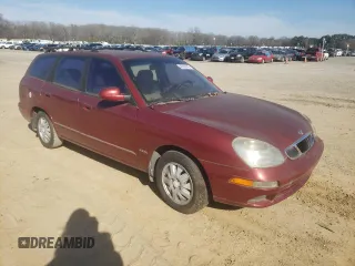 2000 Daewoo Nubira CDX z VIN KLAJB82Z7YK546648, wystawiony jako Copart lot #43050445 z przebiegiem 77 874 mil mil oraz Tytuł czysty. Historia ofert i sprzedaży dostępna na DreamBid. Obrazek 4.