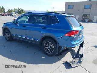 2018 Volkswagen Tiguan SEL with VIN 3VV2B7AX9JM204108, listed as a IAAI auction lot 42504747 with 87,379 mi miles and . Bid and sale history available at DreamBid. Image 3.