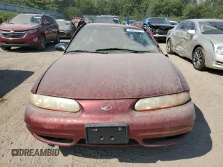 2003 Oldsmobile Alero GL1 z VIN 1G3NL52F13C310849, wystawiony jako Copart lot #68653944 z przebiegiem Nie podano mil oraz Czysty tytuł • Clean title. Historia ofert i sprzedaży dostępna na DreamBid. Obrazek 5.