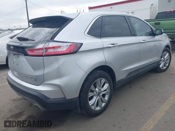 2019 Ford Edge Titanium with VIN 2FMPK4K92KBB89260, listed as a IAAI auction lot 41885743 with 80,001 mi miles. Bid and sale history available at carsss.com. Image 4.
