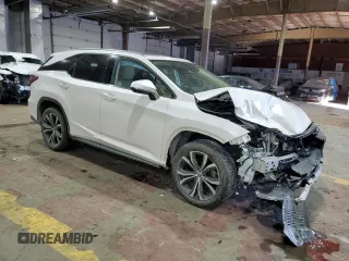 2020 Lexus RX 350L with VIN JTJHZKFA1L2025340, listed as a Copart auction lot 42150215 with 94,304 mi miles and Salvage title. Bid and sale history available at DreamBid. Image 4.