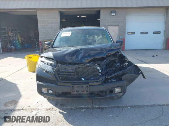 2020 Honda Ridgeline RTL with VIN 5FPYK3F59LB023212, listed as a IAAI auction lot 40704228 with 73,259 mi miles and . Bid and sale history available at DreamBid. Image 13.
