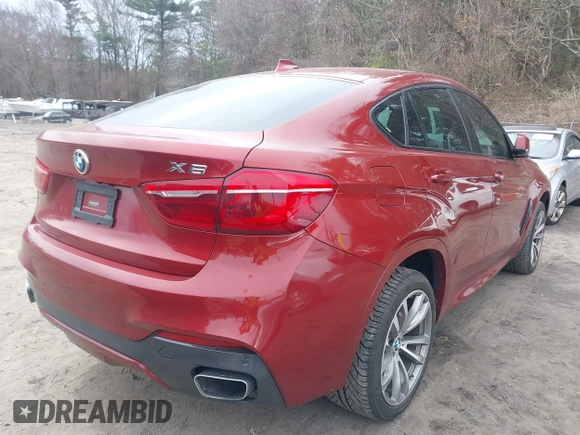 2016 BMW X6 sDrive35i with VIN 5UXKU0C52G0F93330, listed as a IAAI auction lot 41899939 with 126,404 mi miles. Bid and sale history available at carsss.com. Image 4.