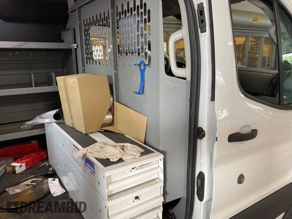 2019 Ford Transit with VIN 1FTYE1YM0KKB31938, listed as a IAAI auction lot 42667322 with 196,239 mi miles and . Bid and sale history available at DreamBid. Image 12.