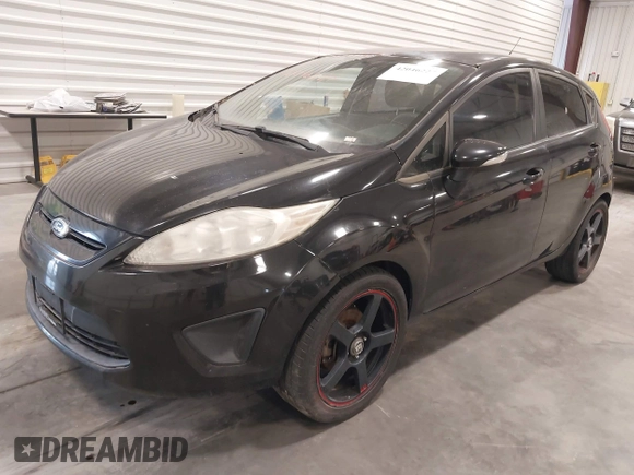 2013 Ford Fiesta SE with VIN 3FADP4EJ5DM195186, listed as a IAAI auction lot 42046227 with 137,794 mi miles. Bid and sale history available at carsss.com. Image 2.