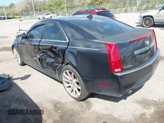 2011 Cadillac CTS Sedan Luxury with VIN 1G6DH5EY8B0116879, listed as a IAAI auction lot 41708842 with 124,550 mi miles. Bid and sale history available at carsss.com. Image 3.