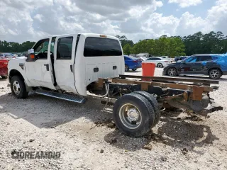 2010 Ford F-350 XL with VIN 1FTWW3DR9AEA59443, listed as a Copart auction lot 61190545 with 147,998 mi miles and Salvage title. Bid and sale history available at DreamBid. Image 2.