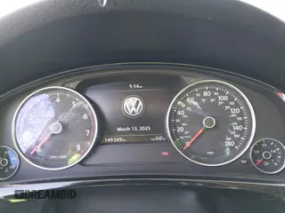 2014 Volkswagen Touareg Sport z VIN WVGEF9BP9ED010718, wystawiony jako IAAI lot #41786403 z przebiegiem 149 569 mil mil oraz . Historia ofert i sprzedaży dostępna na DreamBid. Obrazek 7.