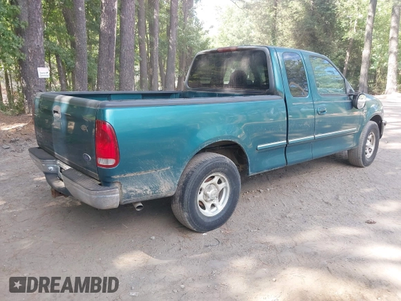 1998 Ford F-150 XL with VIN 1FTRX17L2WNA14048, listed as a IAAI auction lot 42647951 with 217,874 mi miles and . Bid and sale history available at DreamBid. Image 4.