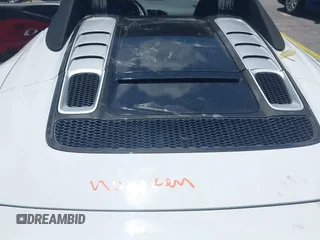 2017 Audi R8 z VIN WUAVACFX0H7903232, wystawiony jako IAAI lot #42247728 z przebiegiem 74 755 mil mil oraz . Historia ofert i sprzedaży dostępna na DreamBid. Obrazek 10.