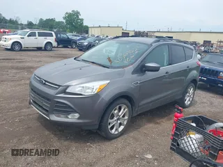 2013 Ford Escape SE with VIN 1FMCU0GX2DUA31362, listed as a IAAI auction lot 42564337 with 157,737 mi miles and . Bid and sale history available at DreamBid. Image 2.