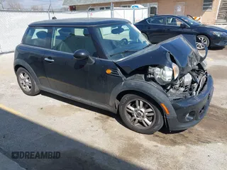 2011 MINI Hardtop with VIN WMWSU3C50BT098967, listed as a IAAI auction lot 42021501 with 120,216 mi miles and . Bid and sale history available at DreamBid. Image 1.