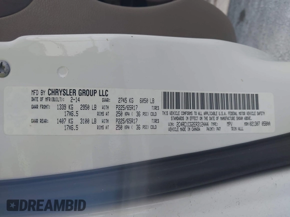 2014 Chrysler Town & Country Touring-L with VIN 2C4RC1CG2ER312444, listed as a IAAI auction lot 42050774 with 124,010 mi miles. Bid and sale history available at carsss.com. Image 9.