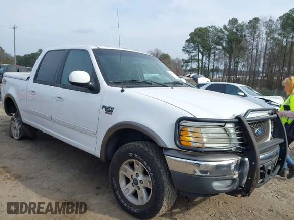 2003 Ford F-150 XLT with VIN 1FTRW08L73KA73945, listed as a IAAI auction lot 41474904 with 122,080 mi miles. Bid and sale history available at carsss.com. Image 1.