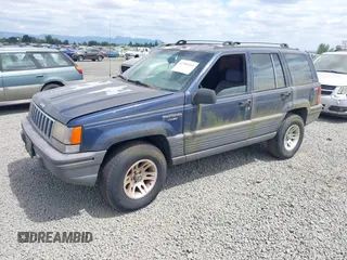 1994 Jeep Grand Cherokee Laredo z VIN 1J4GZ58Y2RC320793, wystawiony jako IAAI lot #42781115 z przebiegiem 275 518 mil mil oraz . Historia ofert i sprzedaży dostępna na DreamBid. Obrazek 2.