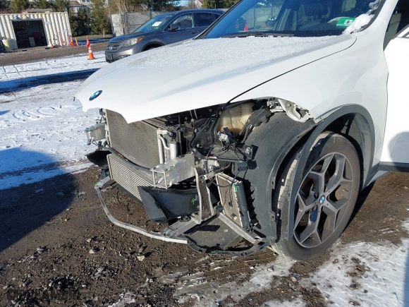 2018 BMW X1 xDrive28i with VIN WBXHT3C36J5L30217, listed as a IAAI auction lot 41237775 with 60,071 mi miles. Bid and sale history available at carsss.com. Image 18.