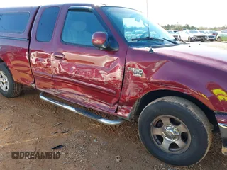2003 Ford F-150 XL with VIN 1FTRX17W43NA07186, listed as a IAAI auction lot 41864354 with 123,565 mi miles. Bid and sale history available at carsss.com. Image 6.