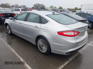2016 Ford Fusion Titanium with VIN 3FA6P0K91GR360914, listed as a IAAI auction lot 41833665 with 107,367 mi miles and . Bid and sale history available at DreamBid. Image 3.