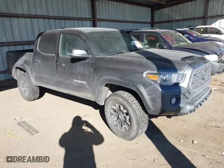 2023 Toyota Tacoma 4WD SR with VIN 3TMCZ5AN0PM540790, listed as a IAAI auction lot 41684912 with 33,024 mi miles. Bid and sale history available at carsss.com. Image 1.