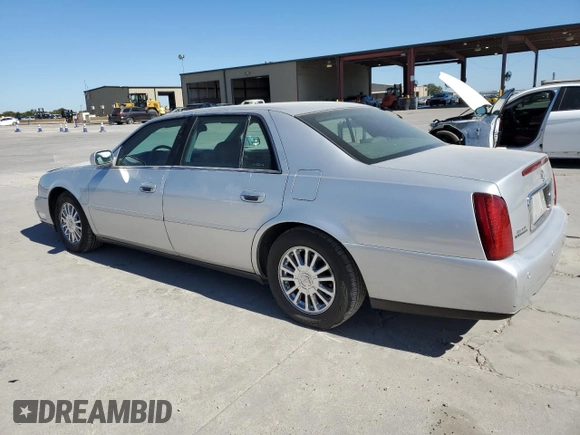 2003 Cadillac DeVille DHS z VIN 1G6KE54Y13U124690, wystawiony jako Copart lot #73757984 z przebiegiem 101 286 mil mil oraz Szkoda całkowita • Salvage title. Historia ofert i sprzedaży dostępna na DreamBid. Obrazek 2.