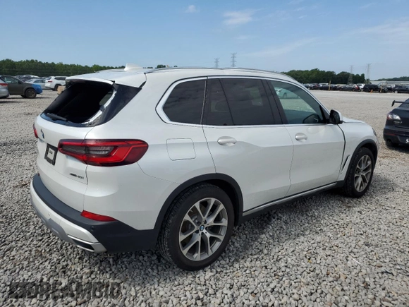 2019 BMW X5 xDrive40i with VIN 5UXCR6C5XKLK80703, listed as a Copart auction lot 63473495 with 57,260 mi miles and Salvage title. Bid and sale history available at DreamBid. Image 3.