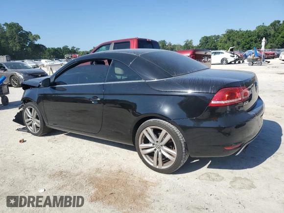2012 Volkswagen Eos Lux with VIN WVWFW7AH7CV016872, listed as a Copart auction lot 52591415 with 121,130 mi miles and Salvage Title. Bid and sale history available at DreamBid. Image 2.