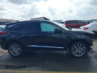 2020 Acura RDX w/Technology Pkg with VIN 5J8TC1H57LL002097, listed as a IAAI auction lot 41957752 with 60,945 mi miles. Bid and sale history available at carsss.com. Image 13.