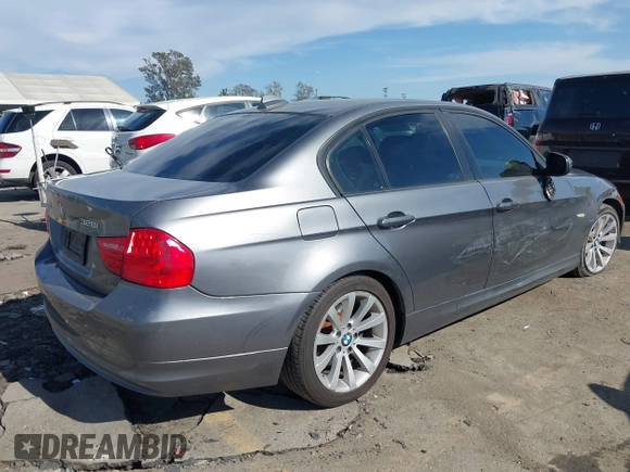 2011 BMW 3 Series 328i with VIN WBAPH5G55BNM71702, listed as a IAAI auction lot 42013598 with 192,744 mi miles. Bid and sale history available at carsss.com. Image 4.