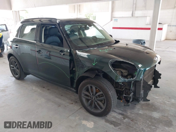2013 MINI Countryman S with VIN WMWZC3C56DWP24170, listed as a IAAI auction lot 42366594 with 143,311 mi miles and . Bid and sale history available at DreamBid. Image 1.