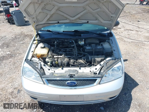2007 Ford Focus S z VIN 1FAFP34N57W109953, wystawiony jako IAAI lot #42225399 z przebiegiem Nie podano mil oraz . Historia ofert i sprzedaży dostępna na DreamBid. Obrazek 10.