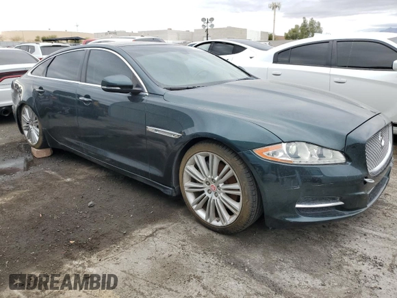 2015 Jaguar XJ with VIN SAJWA2GZ0F8V86007, listed as a Copart auction lot 82233514 with Not Provided miles and Clean Title. Bid and sale history available at carsss.com. Image 4.