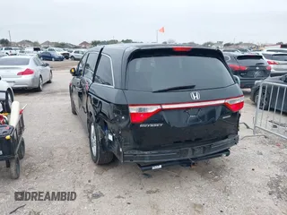 2013 Honda Odyssey Touring with VIN 5FNRL5H9XDB073706, listed as a IAAI auction lot 41591111 with 158,305 mi miles and . Bid and sale history available at carsss.com. Image 3.