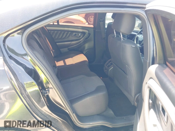 2013 Ford Taurus SEL z VIN 1FAHP2E86DG181780, wystawiony jako IAAI lot #41874666 z przebiegiem 133 175 mil mil oraz . Historia ofert i sprzedaży dostępna na DreamBid. Obrazek 8.