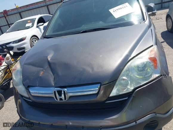 2009 Honda CR-V EX-L with VIN 5J6RE48709L049500, listed as a IAAI auction lot 41998161 with 257,068 mi miles. Bid and sale history available at carsss.com. Image 12.