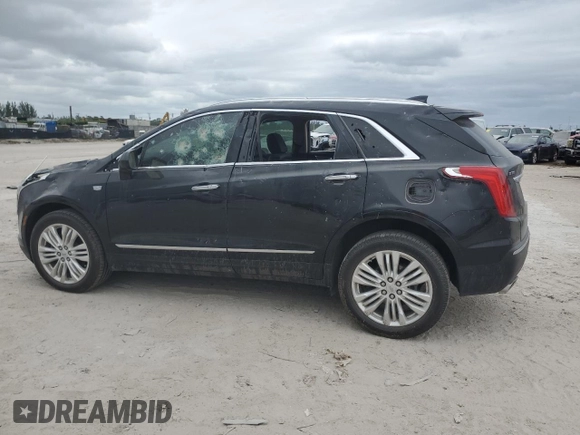 2018 Cadillac XT5 Premium Luxury FWD z VIN 1GYKNERS6JZ139813, wystawiony jako Copart lot #78760374 z przebiegiem 96 567 mil mil oraz Nie do naprawy. Historia ofert i sprzedaży dostępna na DreamBid. Obrazek 2.