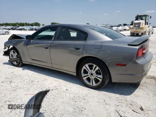 2011 Dodge Charger RT Max with VIN 2B3CM5CT7BH572445, listed as a Copart auction lot 66782634 with 129,743 mi miles and Salvage Title. Bid and sale history available at carsss.com. Image 2.