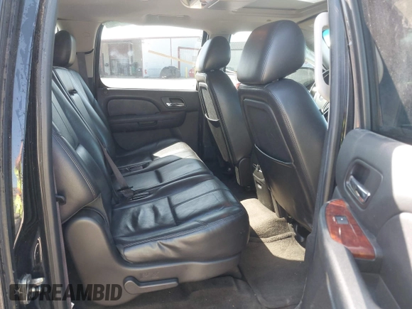 2014 Chevrolet Suburban LT with VIN 1GNSCJE00ER198703, listed as a IAAI auction lot 41952805 with 228,579 mi miles and . Bid and sale history available at DreamBid. Image 8.