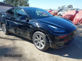 2023 Tesla Model Y Long Range with VIN 7SAYGAEEXPF673871, listed as a IAAI auction lot 41980174 with 45,870 mi miles and . Bid and sale history available at DreamBid. Image 1.
