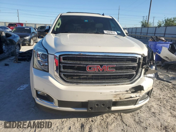 2015 GMC Yukon XL SLT with VIN 1GKS1HKC6FR166415, listed as a Copart auction lot 73029014 with 105,209 mi miles and Salvage Title. Bid and sale history available at carsss.com. Image 5.