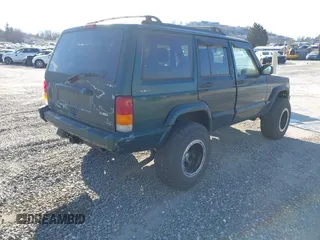2001 Jeep Cherokee Sport with VIN 1J4FF58S41L619254, listed as a IAAI auction lot 41596384 with 180,826 mi miles and . Bid and sale history available at DreamBid. Image 4.