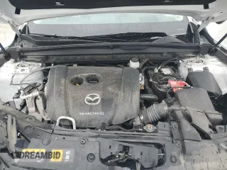 2023 Mazda CX-50 S Premium Plus z VIN 7MMVABEM0PN133946, wystawiony jako Copart lot #51903995 z przebiegiem 24 343 mil mil oraz Szkoda całkowita • Salvage title. Historia ofert i sprzedaży dostępna na DreamBid. Obrazek 12.