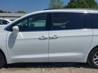 2022 Chrysler Pacifica Touring L with VIN 2C4RC1BG4NR191644, listed as a IAAI auction lot 41979011 with 84,789 mi miles and . Bid and sale history available at DreamBid. Image 14.