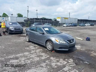2017 Nissan Altima SV with VIN 1N4AL3AP4HC142859, listed as a IAAI auction lot 42634041 with 156,588 mi miles and . Bid and sale history available at DreamBid. Image 1.