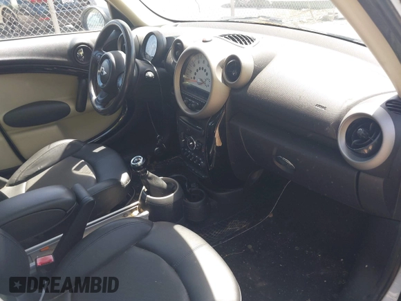 2012 MINI Countryman S z VIN WMWZC3C58CWM26699, wystawiony jako IAAI lot #42361630 z przebiegiem 88 177 mil mil oraz . Historia ofert i sprzedaży dostępna na DreamBid. Obrazek 5.