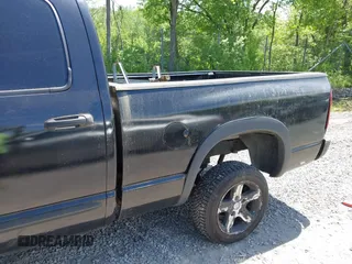 2003 Dodge 1500 SLT z VIN 1D7HU18N93J565767, wystawiony jako IAAI lot #42366236 z przebiegiem 182 372 mil mil oraz . Historia ofert i sprzedaży dostępna na DreamBid. Obrazek 6.