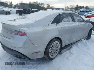 2014 Lincoln MKZ z VIN 3LN6L2J92ER832064, wystawiony jako IAAI lot #41374046 z przebiegiem 84 000 mil mil oraz . Historia ofert i sprzedaży dostępna na DreamBid. Obrazek 4.